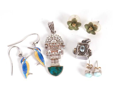 A small quantity of jewelley to include an Aztec style white metal pendant, three pairs of earrings and a gemset pendant, (5)