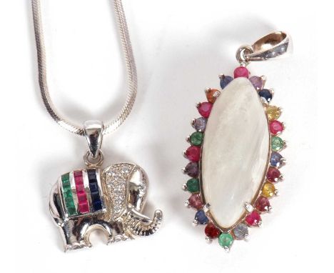 Two gemset pendants, to include a gemset elephant necklace, the elephant with an emerald, ruby and sapphire set howdah, with 