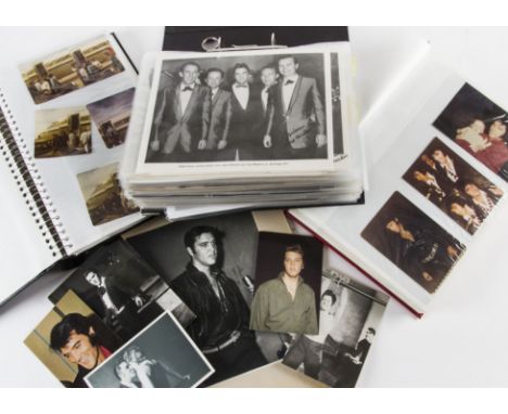 Elvis Presley, three folders and one packet of various sized photographs, approximately five hundred in total, promotional an