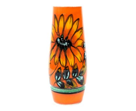 A Poole Delphis ware vase, of ovoid form, decorated with flowers against an orange ground, printed and painted marks, 40.5cm 