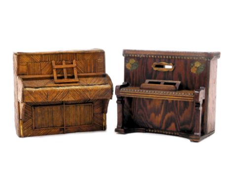 An early 20thC matchstick model of an upright piano, 16cm wide, together with a wooden money box, carved as an upright piano,
