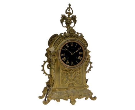 A late 19thC French brass cased mantel clock, By J Delaye, Grenoble, circular black dial bearing Roman numerals, eight day mo
