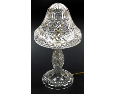 A cut glass table lamp, with a cut bell shaped shade, 45cm high.