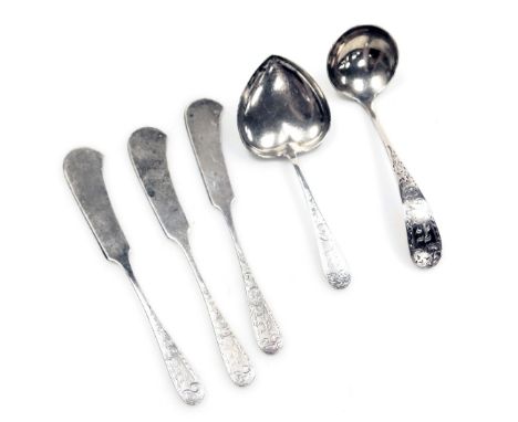 A group of sterling silver flatware, foliate engraved, reserve initial engraved, comprising a jam spoon, cream ladle, and thr
