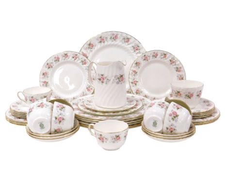 A Minton porcelain Spring Bouquet pattern part dinner and tea service, comprising seven dinner and nine dessert plates, cream
