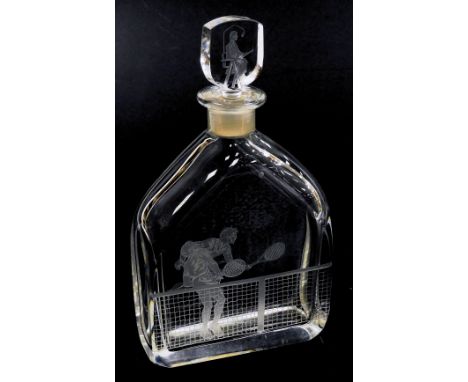An Orrefors engraved cut glass tennis commemorative decanter and stopper, engraved with a tennis match, and an umpire to the 