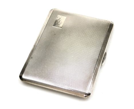 An Elizabeth II silver cigarette case, with engine turned decoration, rectangular reserve, monogram engraved, Birmingham 1961