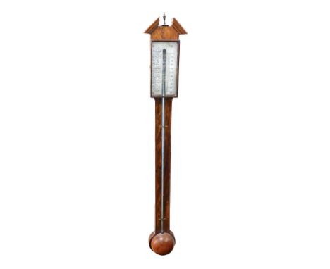 A Georgian style oak stick barometer, by E &amp; AJ Snowden of Elston, Notts, with a rectangular silvered scale, the case of 