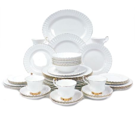 A Royal Albert porcelain Val D'Or pattern part dinner and tea service, comprising oval meat platter, ten dinner, nine dessert