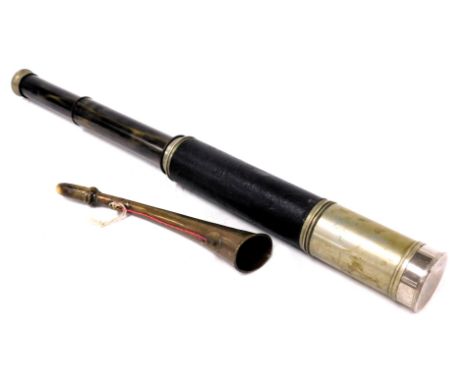 A two draw telescope, leather bound, 73cm long extended, together with a French brass hunting horn, by J Tournier, Paris, 27.