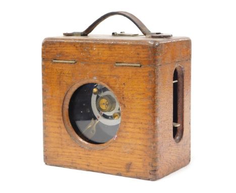 An early 20thC Coulet Excelsior pigeon racing timer, oak cased, 20cm wide. (AF)