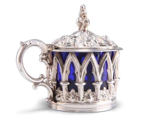 A WILLIAM IV 'GOTHIC' SILVER MUSTARD POT by Henry Wilkinson &amp; Co, Sheffield 1836, pierced circular form with leaf-capped 