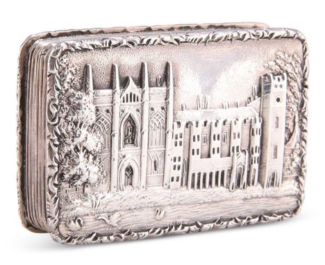 A WILLIAM IV SILVER CASTLE-TOP VINAIGRETTE by Nathaniel Mills, Birmingham 1836, rectangular form, the hinged cover with a rai