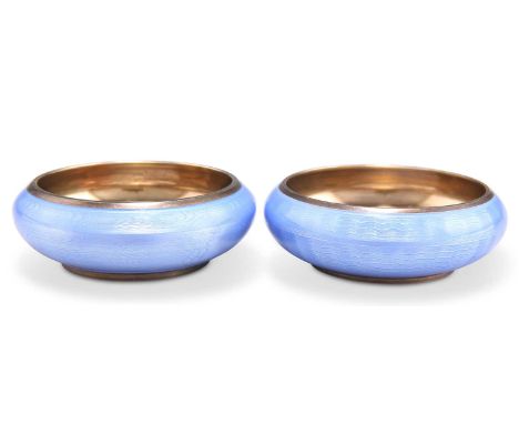 A PAIR OF EARLY 20TH CENTURY NORWEGIAN SILVER GILT AND POWDER BLUE GUILLOCHE ENAMEL OPEN SALTS by David Andersen, 925 grade, 