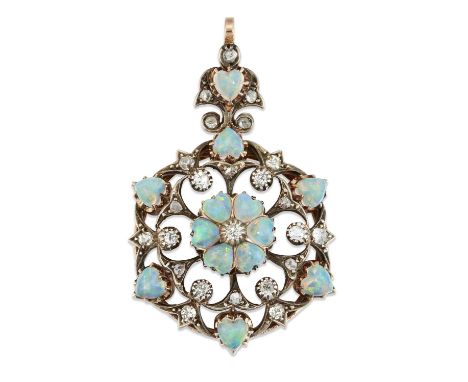 AN EARLY 20TH CENTURY OPAL AND DIAMOND BROOCH / PENDANT a cluster of heart-cut opals within an openwork frame of further opal