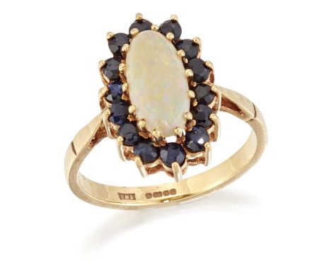 A 9 CARAT GOLD OPAL AND SAPPHIRE CLUSTER RING an oval opal within a border of round-cut sapphires. Hallmarked Birmingham 1997