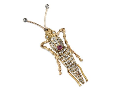 AN EARLY 20TH CENTURY DIAMOND AND RUBY NOVELTY CRICKET BROOCH set throughout with old-cut diamonds and a cushion-cut ruby. Es