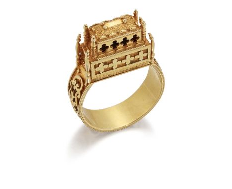 A JEWISH BETROTHAL RING modelled as a temple, opening to reveal 'Mazal Tov' in blue enamel, to a broad shank with scroll work