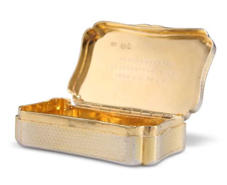 A GEORGE III SILVER-GILT SNUFF BOX by John Reily, London 1816, shaped rectangular with an engine-turned ground, presentation 