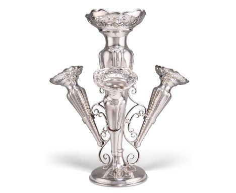 A GEORGE V SILVER EPERGNE by Walker &amp; Hall, Sheffield 1911, the central fluted and tapering trumpet issuing scrolling str