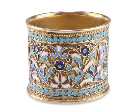 A RUSSIAN SILVER AND CHAMPLEVÉ ENAMEL NAPKIN RING master AH, Kokoshnik mark, c.1905, picked out with blue, red, white and tur