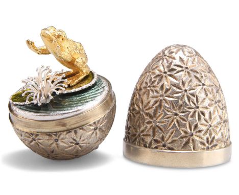 AN ELIZABETH II SILVER-GILT SURPRISE EGG by Stuart Devlin, London 1978, opening to reveal a frog standing on green enamelled 