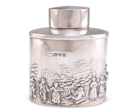 A GEORGE V SILVER CADDY by S Blanckensee &amp; Son Ltd, Chester 1935, oval, chased with villagers. 8.5cm high, 7.5cm wide, 2.