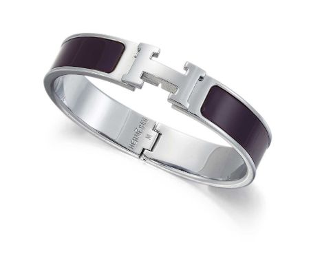 HERMÈS - A CLIC CLAC H BANGLE filled with purple enamel, with 'H' clasp, marked 'Hermès R', with pouch and boxVery light surf