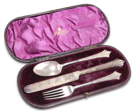 A VICTORIAN SILVER THREE-PIECE CHRISTENING SET by Francis Higgins III, London 1883 and 1885, comprising knife, fork and spoon