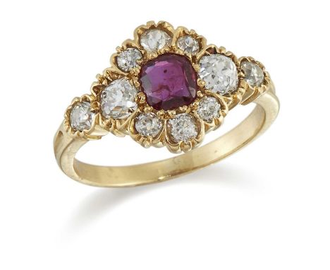 A RUBY AND DIAMOND CLUSTER RING a cushion-cut ruby within a border of old-cut diamonds, to diamond-set shoulders. Estimated t