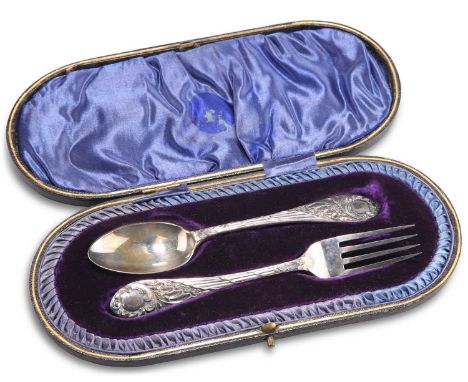 AN EDWARDIAN SILVER CHRISTENING SET by John Round &amp; Son Ltd, Sheffield 1902 and 1903, in a fitted case. Fork 15cm long, 2