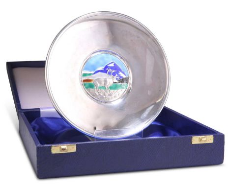 A NORWEGIAN SILVER AND ENAMEL DISH by N.M. Thune, Oslo, circular, the centre enamelled with a stag in a landscape, 925 grade,