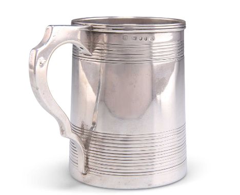 A VICTORIAN SILVER MUG by Henry Wilkinson &amp; Co, Sheffield 1852, of tapering cylindrical form with scroll-form handle and 