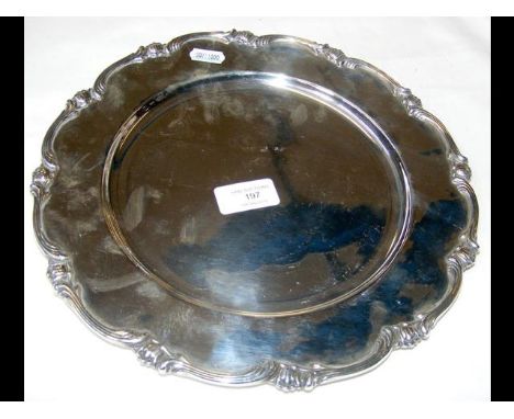 A 28cm diameter white metal plate 