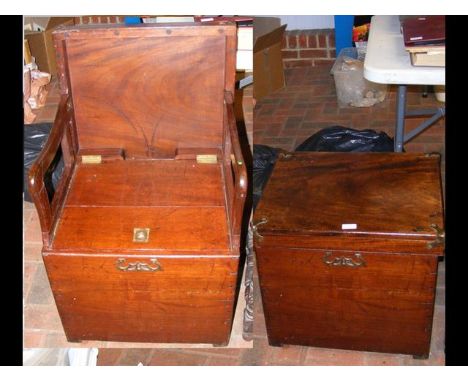 A Georgian mahogany cased commode with brass handles to the side 