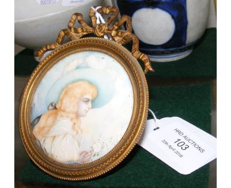 Small circular antique miniature portrait of lady wearing blue hat 