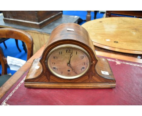 An early 20th Century napoleon mantel clock with marquetry decoration