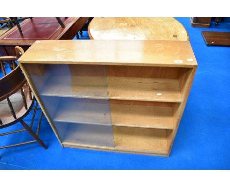 A vintage light oak low bookcase
approx 90cm by 89cm by 23cm.
&nbsp;
some watermarks and varnish loss.