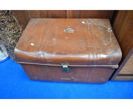 A vintage tin trunk
approx 51cm deep by 76cm long by 46cm high.