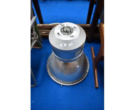 An industrial ceiling light fitting in aluminium casing