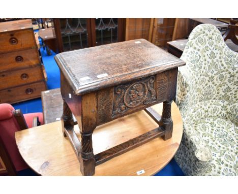 A period style oak carved box stool