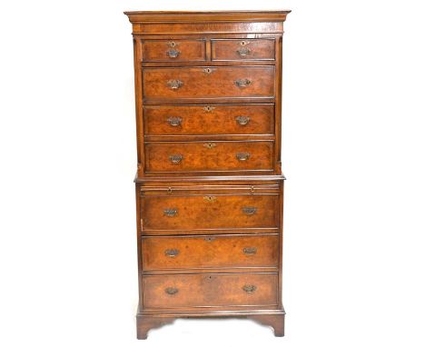 Small walnut chest on chest, moulded cornice above two short and six long drawers, brushing slide, bracket feet, width 69cm, 