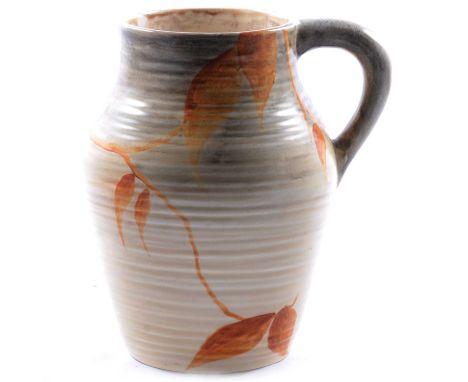 Clarice Cliff, a small Isis jug, circa 1935, ribbed body, painted with autumnal leaves against a graduating grey ground, Biza