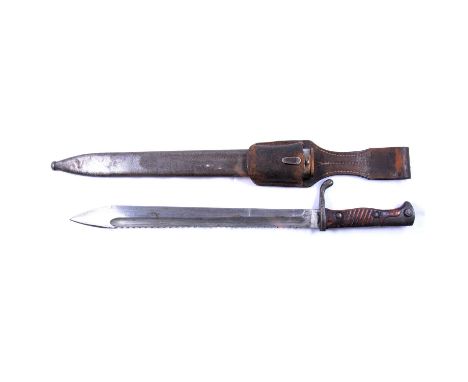 Fichtel &amp; Sachs Schweinfurt saw back 'butcher' bayonet, with metal scabbard and leather frog, length overall 54cm.