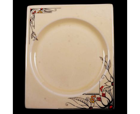 Clarice Cliff, a Biarritz side plate, black floral design with red and yellow highlights against a honeyglaze ground, Royal S