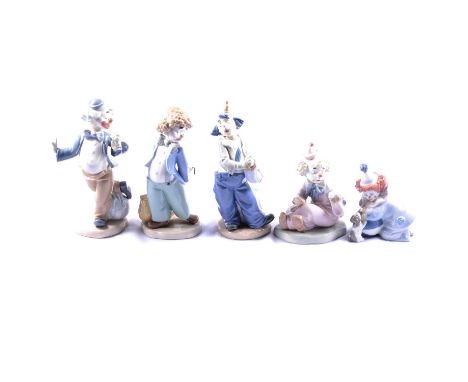 Four Nao and a Lladro clown figurine, the largest 21.5cm.Condition report:Clown with umbrella - handle is bentAll other items