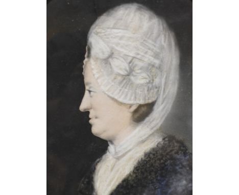 Attributed to Downman, R.A., An oval framed portrait of lady wearing a blue dress and white bonnet, pastel, image cut to prof