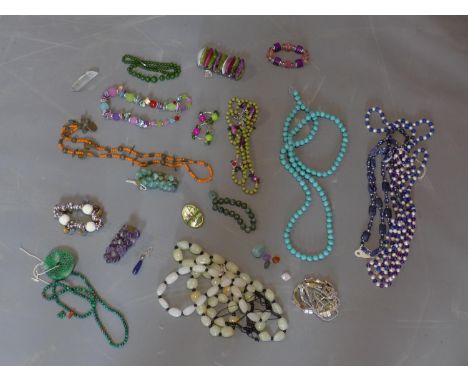 A collection of jewellery, to include a Russian mother of pearl brooch decorated with landscape scene, a group of amethyst st