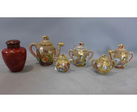 A Japanese Kutani 5 piece dragon ware teaset, with gilt decoration depicting Geisha girls and deities, comprising a teapot; m