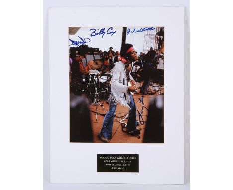 Woodstock - Photo of Jimi Hendrix signed by Mitch Mitchell, Billy Cox, Larry Lee, Juma Sultan and Jerry Valez, mounted, 28 x 